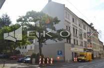 EkoPa Immobilien - Vollvermietetes Wohn- und Geschäftshaus mit 17 Garagen und einer Halle